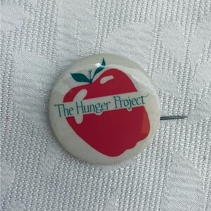 Vtg The Hunger Project pin badge non profit organization button